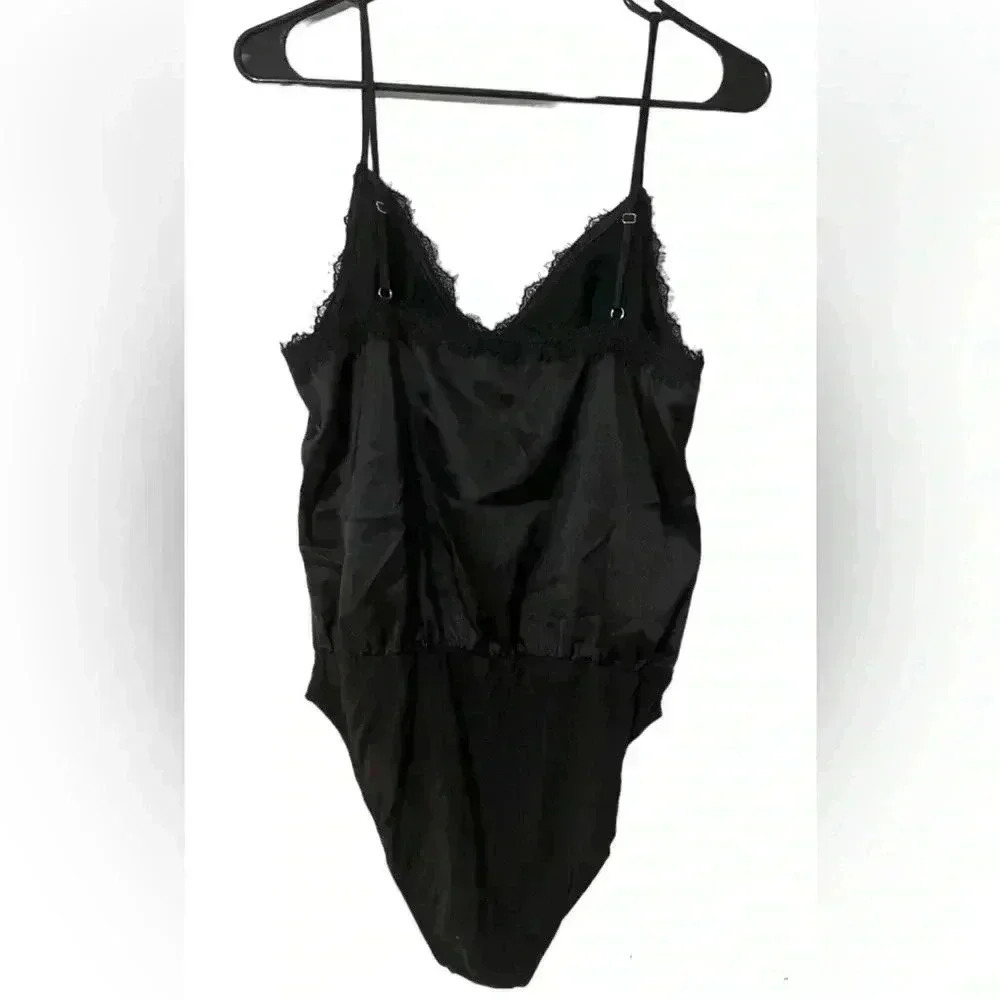 Forever 21 Satin Bodysuit. New without tags.